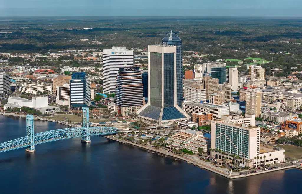 Aerial view of downtown Jacksonville along the St. Johns River with the Main Street Bridge